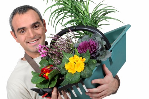 Supervised gardeners following site safety procedures